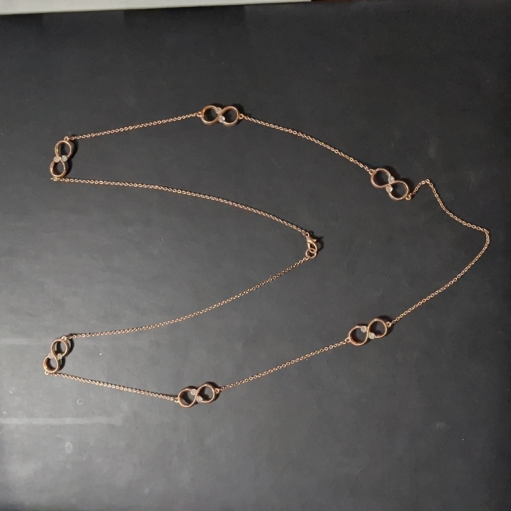 Copper Tone Infinity Symbol Clear Rhinestone Dainty Delicate Statement Necklace